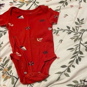 Vibrant Red Nautical Bodysuit with Stars and Sailboats
